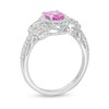 Oval Pink Sapphire and 3/8 CT. T.W. Diamond Frame Three Stone Ring in 14K White Gold
