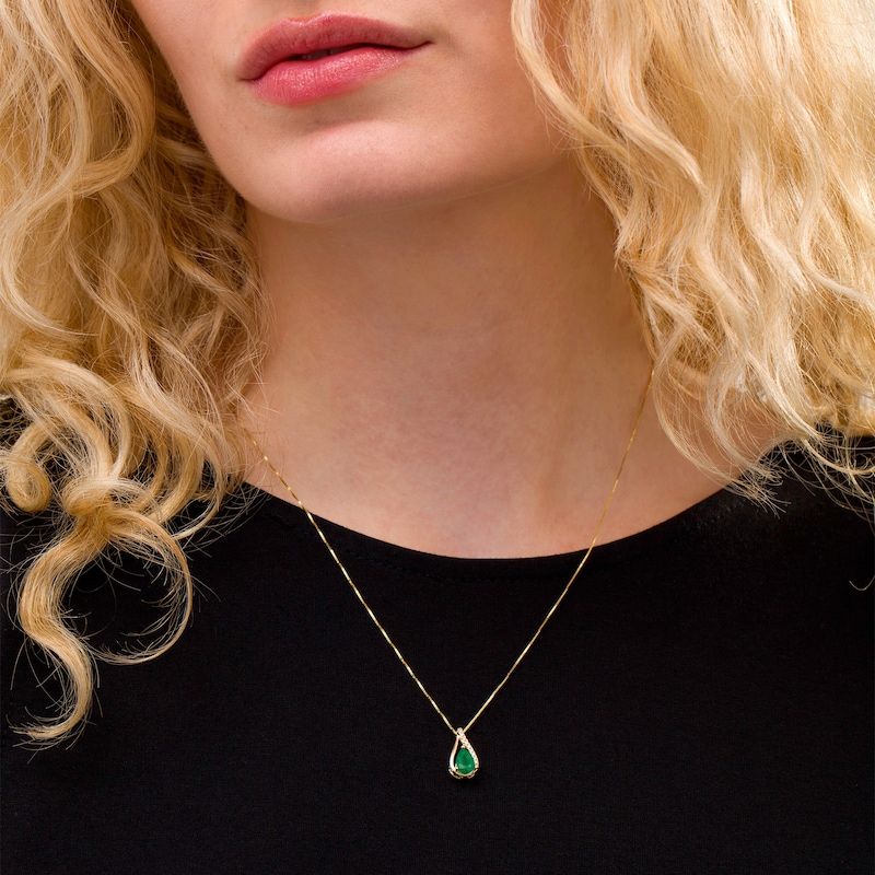 Main Image 2 of Pear-Shaped Emerald and 1/20 CT. T.W. Diamond Teardrop Pendant in 10K Gold