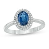 Thumbnail Image 0 of Oval Blue Sapphire and 1/6 CT. T.W. Diamond Double Frame Ring in 10K White Gold