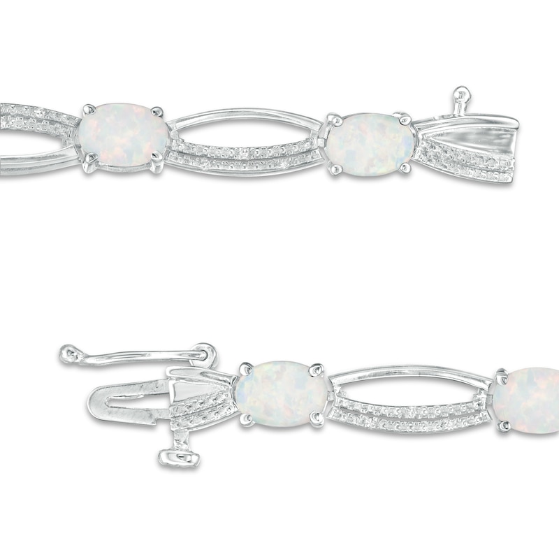 Oval Lab-Created Opal and 1/10 CT. T.W. Diamond Open Marquise Bracelet in Sterling Silver - 7.5"