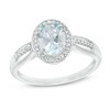 Thumbnail Image 0 of Oval Aquamarine and 1/8 CT. T.W. Diamond Frame Open Shank Ring in 10K White Gold