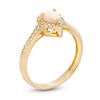 Pear-Shaped Opal and 1/6 CT. T.W. Diamond Frame Ring in 10K Gold