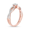 1/2 CT. T.W. Diamond Twist Shank Engagement Ring in 10K Rose Gold