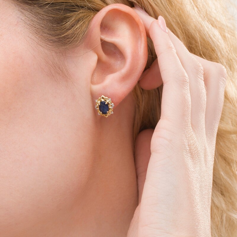 Main Image 2 of Oval Blue Sapphire and 1/15 CT. T.W. Diamond Ornate Stud Earrings in 10K Gold