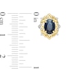 Thumbnail Image 3 of Oval Blue Sapphire and 1/15 CT. T.W. Diamond Ornate Stud Earrings in 10K Gold