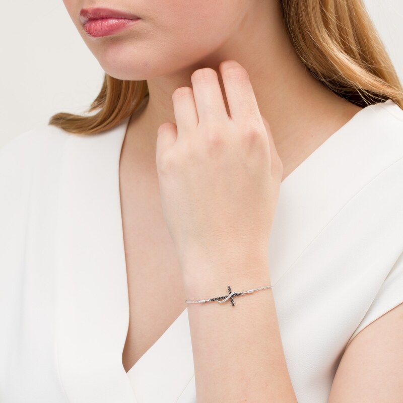 Main Image 2 of 1/6 CT. T.W. Enhanced Black and White Diamond Ribbon Cross Bolo Bracelet in Sterling Silver - 9.5"