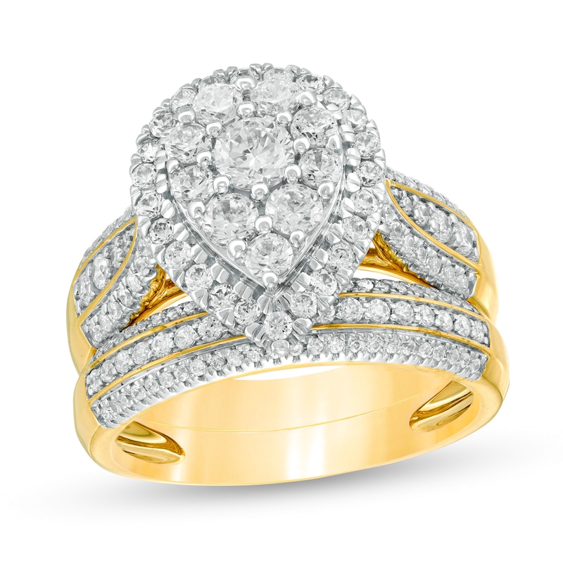 1-1/2 CT. T.W. Pear-Shaped Multi-Diamond Frame Multi-Row Bridal Set in 10K Gold