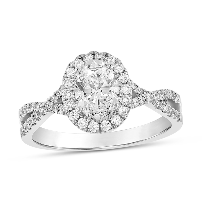 1 CT. T.W. Oval Diamond Frame Twist Shank Engagement Ring in 18K White Gold (G/SI2)