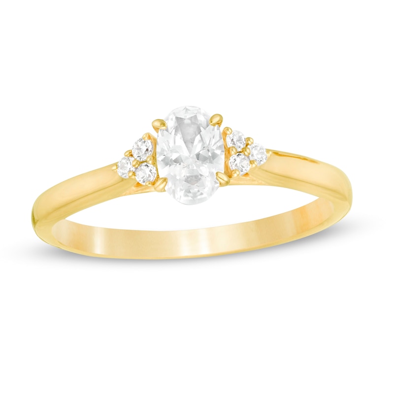 5/8 CT. T.W. Oval Diamond Tri-Sides Engagement Ring in 14K Gold