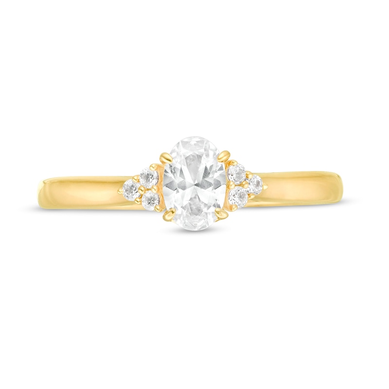 5/8 CT. T.W. Oval Diamond Tri-Sides Engagement Ring in 14K Gold