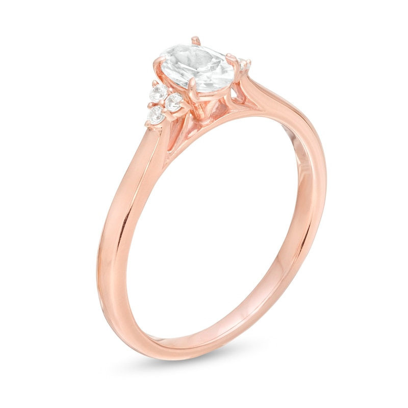 5/8 CT. T.W. Oval Diamond Tri-Sides Engagement Ring in 14K Rose Gold