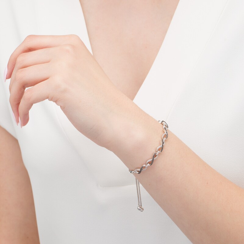 Main Image 2 of 1/6 CT. T.W. Enhanced Black and White Diamond Infinity Bolo Bracelet in Sterling Silver - 9.5"
