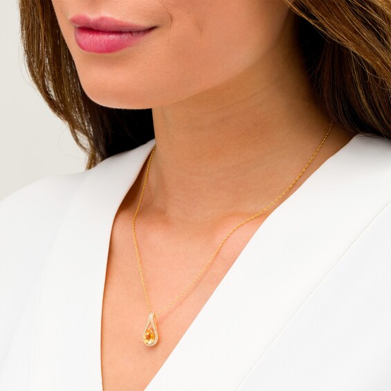 Pear-Shaped Citrine and 1/8 CT. T.w. Diamond Teardrop Pendant in 10K Gold