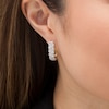 Thumbnail Image 2 of 1-1/2 CT. T.W. Diamond Cascading Twist Hoop Earrings in 10K Gold