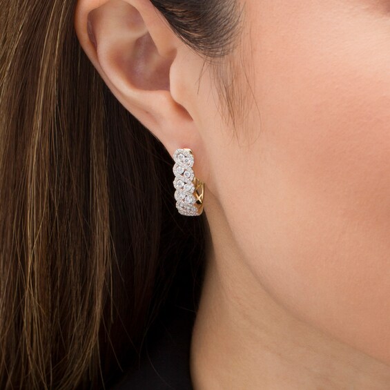 1-1/2 CT. T.w. Diamond Cascading Twist Hoop Earrings in 10K Gold