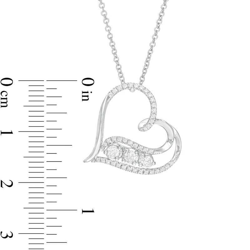Main Image 4 of 1/3 CT. T.W. Diamond Past Present Future® Tilted Heart Pendant in 10K White Gold