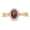 Thumbnail Image 3 of Oval Garnet and 1/15 CT. T.W. Diamond Frame Twist Shank Ring in 10K Gold