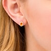 Oval Citrine and 1/10 CT. T.W. Diamond Frame Stud Earrings in 10K Gold