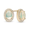 Thumbnail Image 1 of Oval Opal and 1/10 CT. T.W. Diamond Frame Stud Earrings in 10K Gold