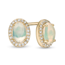Oval Opal and 1/10 CT. T.W. Diamond Frame Stud Earrings in 10K Gold