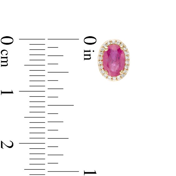 Oval Ruby and 1/10 CT. T.w. Diamond Frame Stud Earrings in 10K Gold