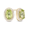 Thumbnail Image 0 of Oval Peridot and 1/10 CT. T.W. Diamond Frame Stud Earrings in 10K Gold