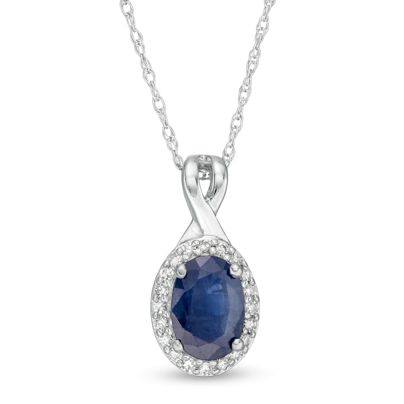 Main Image 1 of Oval Blue Sapphire and 1/15 CT. T.W. Diamond Frame Pendant in 10K White Gold