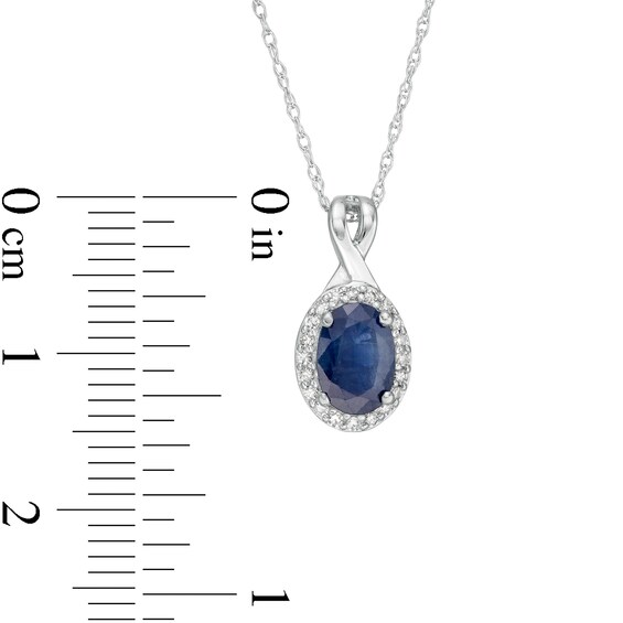 Oval Blue Sapphire and 1/15 CT. T.w. Diamond Frame Pendant in 10K White Gold