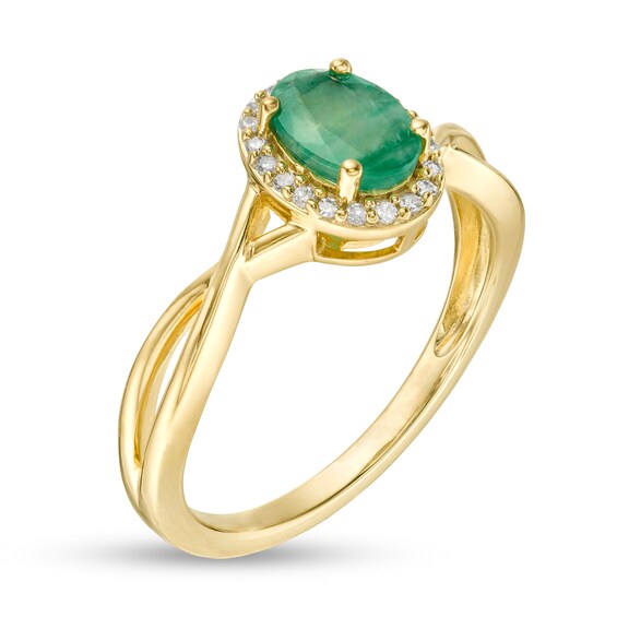 Oval Emerald and 1/15 CT. T.w. Diamond Frame Twist Shank Ring in 10K Gold