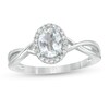 Thumbnail Image 0 of Oval Aquamarine and 1/15 CT. T.W. Diamond Frame Twist Shank Ring in 10K White Gold