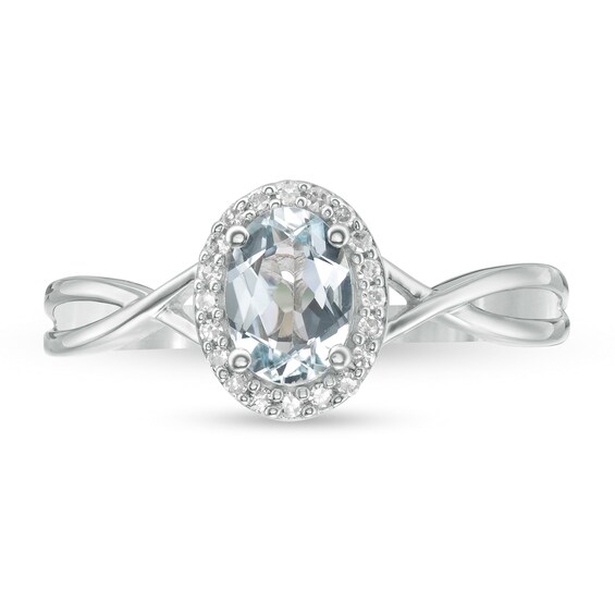 Oval Aquamarine and 1/15 CT. T.w. Diamond Frame Twist Shank Ring in 10K White Gold
