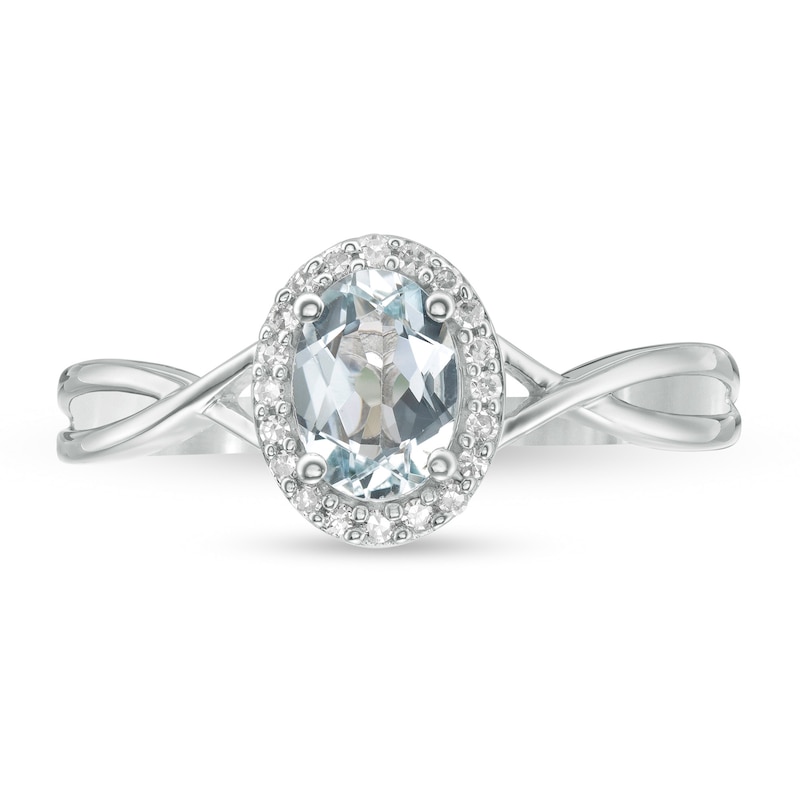 Oval Aquamarine and 1/15 CT. T.W. Diamond Frame Twist Shank Ring in 10K White Gold