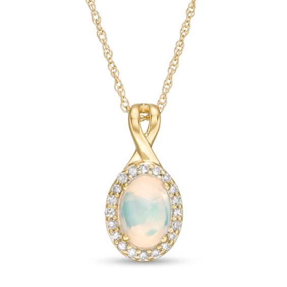 Oval Opal and 1/15 CT. T.w. Diamond Frame Pendant in 10K Gold