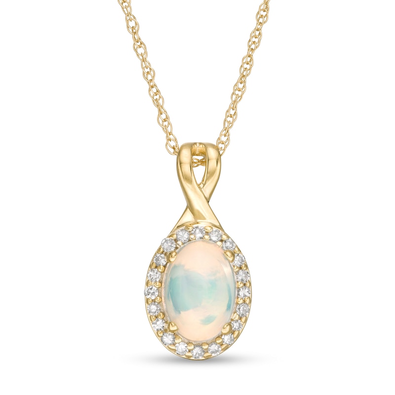 Oval Opal and 1/15 CT. T.W. Diamond Frame Pendant in 10K Gold