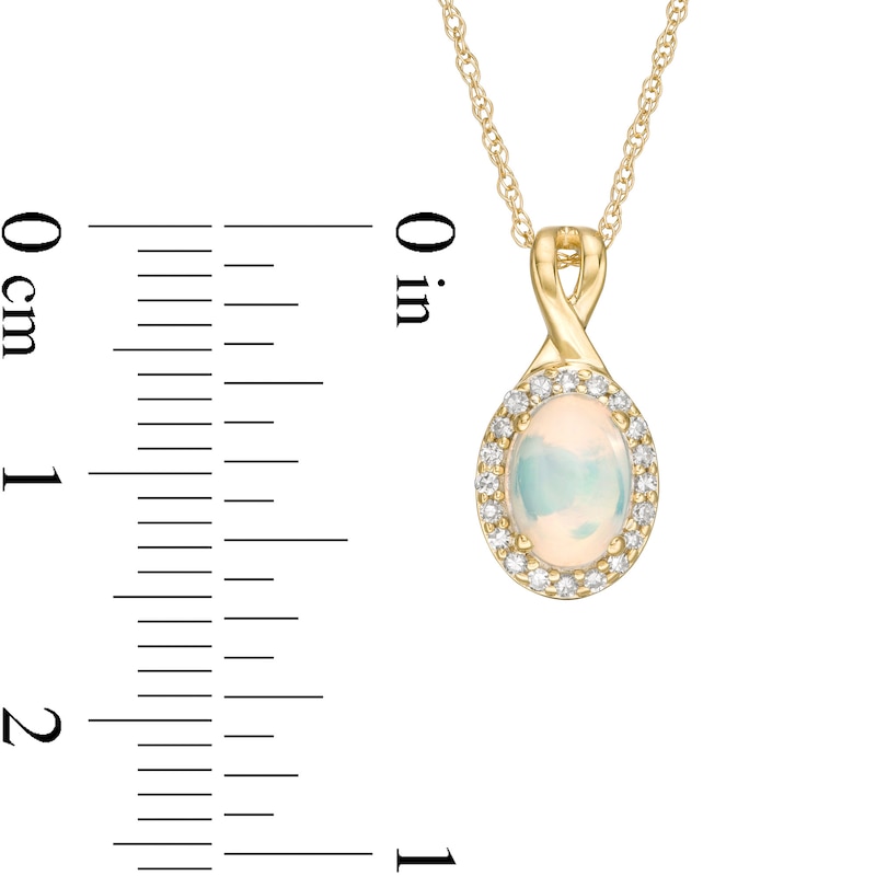 Oval Opal and 1/15 CT. T.W. Diamond Frame Pendant in 10K Gold