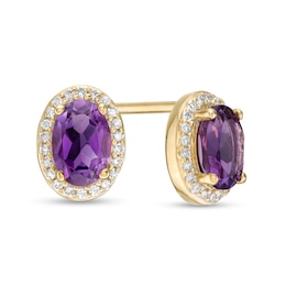 Oval Amethyst and 1/10 CT. T.W. Diamond Frame Stud Earrings in 10K Gold