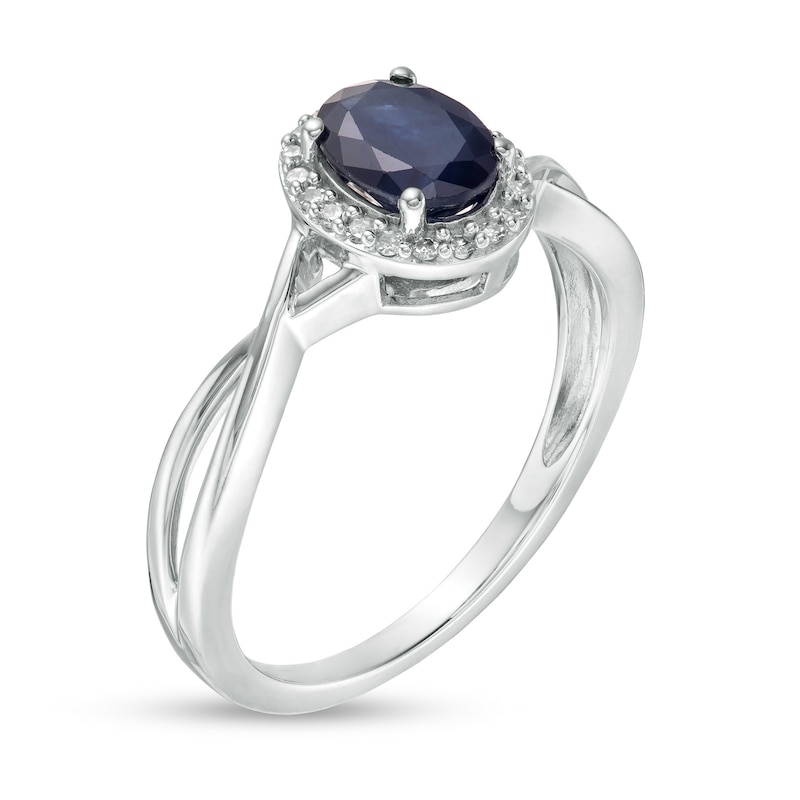 Oval Blue Sapphire and 1/15 CT. T.W. Diamond Frame Twist Shank Ring in 10K White Gold