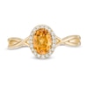 Thumbnail Image 3 of Oval Citrine and 1/15 CT. T.W. Diamond Frame Twist Shank Ring in 10K Gold