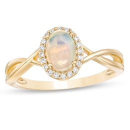 Oval Opal and 1/15 CT. T.W. Diamond Frame Twist Shank Ring in 10K Gold