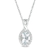 Thumbnail Image 0 of Oval Aquamarine and 1/15 CT. T.W. Diamond Frame Pendant in 10K White Gold