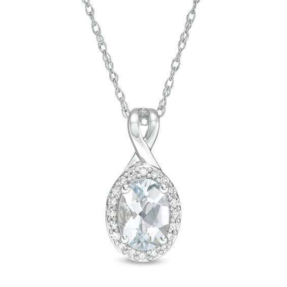 Oval Aquamarine and 1/15 CT. T.w. Diamond Frame Pendant in 10K White Gold