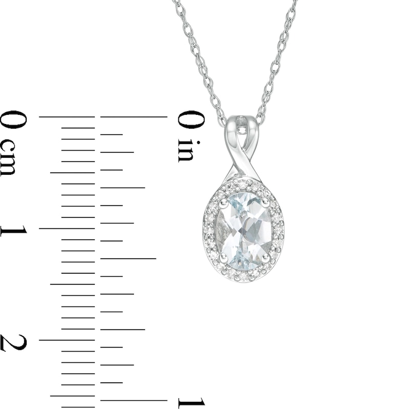 Oval Aquamarine and 1/15 CT. T.W. Diamond Frame Pendant in 10K White Gold