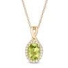 Thumbnail Image 1 of Oval Peridot and 1/15 CT. T.W. Diamond Frame Pendant in 10K Gold