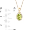 Thumbnail Image 2 of Oval Peridot and 1/15 CT. T.W. Diamond Frame Pendant in 10K Gold