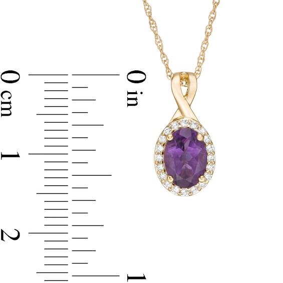 Oval Amethyst and 1/15 CT. T.w. Diamond Frame Pendant in 10K Gold