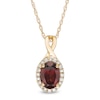 Thumbnail Image 0 of Oval Garnet and 1/15 CT. T.W. Diamond Frame Pendant in 10K Gold