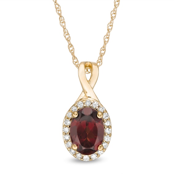Oval Garnet and 1/15 CT. T.w. Diamond Frame Pendant in 10K Gold
