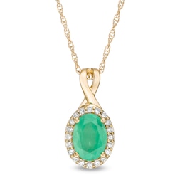 Oval Emerald and 1/15 CT. T.W. Diamond Frame Pendant in 10K Gold