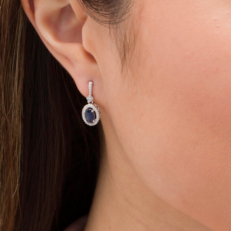 Main Image 2 of Oval Blue Sapphire and 1/5 CT. T.W. Diamond Frame Drop Earrings in 10K White Gold