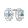 Thumbnail Image 1 of Oval Aquamarine and 1/10 CT. T.W. Diamond Frame Stud Earrings in 10K White Gold